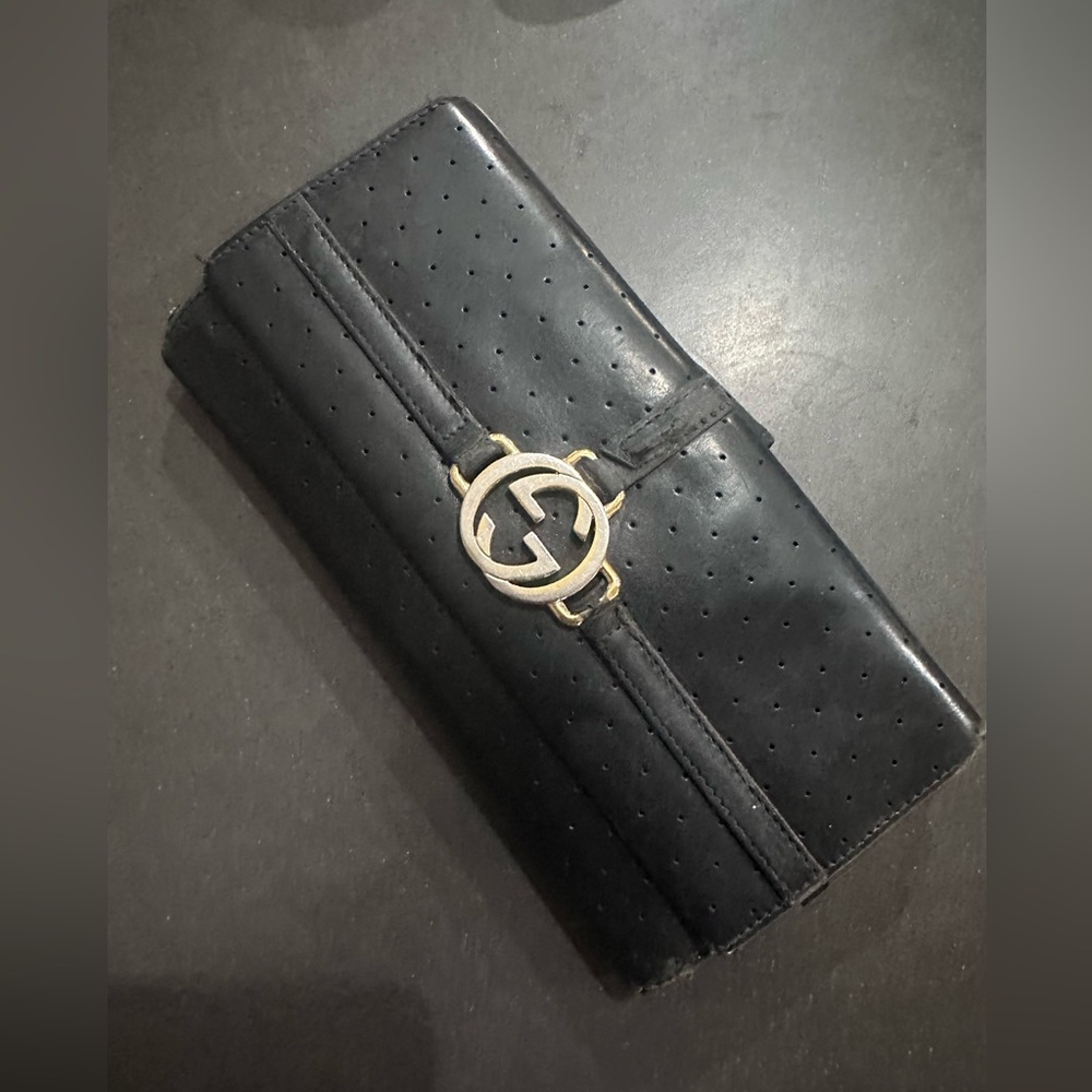 Gucci GG leather perforated wallet